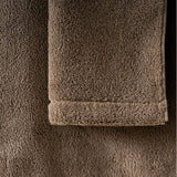 Close-up of brown towels with a textured surface