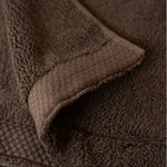 Close-up of a brown towel with textured surface
