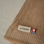 Sirocco towel with 'somn and Imabari' label